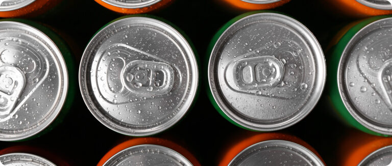 Top view of dewy cans of functional beverages.